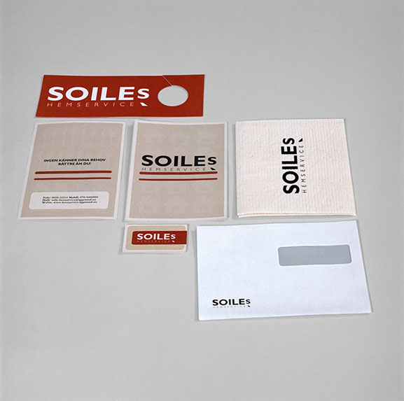 Folder visitkort dörrhängare tryckt disktrasa och brev.