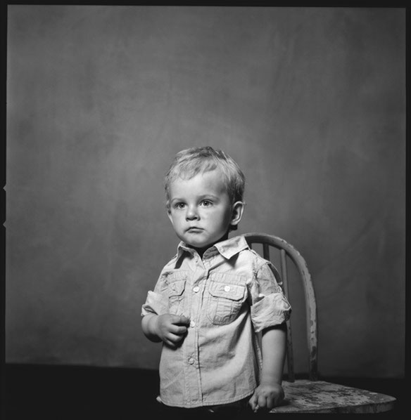 Barnporträtts fotografering i Hudiksvall, fotograferat av fotograf Henrik Peltonen